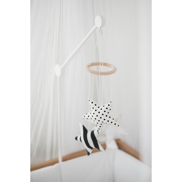 White wooden cot mobile arm